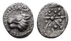 ASIA MINOR.Uncertain.(5th-4th century BC).Hemiobol.

Obv : Head of horned lion (?) left .

Rev : Incuse square divided into eight sections each co...