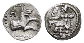 LYCAONIA.Laranda.( Circa 324-323 BC).Obol.

Obv : Λ.
Forepart of a wolf to right.

Rev : Baaltars seated left, holding grain ear, grapes, and sceptre....