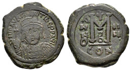 MAURICE TIBERIUS.(582-602).Constantinople.Ae.

Obv : D N MAVRC TIbЄR P P AVG.
Helmeted and cuirassed facing bust of Maurice Tiberius, holding globus c...