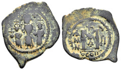 HERACLIUS with MARTINA and HERACLIUS CONSTANTINE.(610-641). Follis.

Obv : Martina on left, Heraclius, bearded, in centre, and Heraclius Constantine...