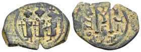 HERACLIUS with MARTINA and HERACLIUS CONSTANTINE (610-641).Uncertain mint in Cyprus. Follis.

Obv : Martina, Heraclius and Heraclius Constantine stand...