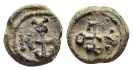 BYZANTINE LEAD SEAL.(Circa 7th-11th Century).Pb.

Weight : 3.1 gr
Diameter : 13 mm