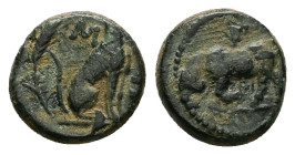Thrace, Madytos. Ae, 1.68 g 11.55 mm. Circa 350 BC.
Obv.: Μ-[ΑΔΥ]; Dog seated right; behind, ear of grain.
Rev.: Bull butting left; above, kantharus. ...