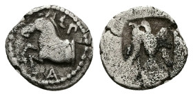 Kings of Thrace, Odrysian. Sparadokos. AR Diobol. 1.15 g 12.21 mm. Circa 450-440 BC.
Obv: Forepart of horse left.
Rev: Eagle flying left, holding serp...