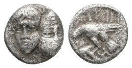 Moesia, Istros. AR Diobol, 1.25 g 11.00 mm. Circa 400-350 BC. 
Obv: Facing male heads, the left inverted.
Rev: ΙΣΤΡΙΗ,Sea eagle right, grasping dolphi...