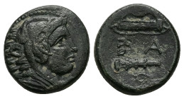 Kings of Macedon, Alexander III 'the Great'. Ae, 5.69 g 18.10 mm. 336-323 BC. Uncertain Macedonian mint.
Obv: Head of Herakles right, wearing lion ski...