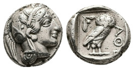 Attica, Athens. AR Drachm, 4.25 g 15.32 mm. Circa 454-404 BC.
Obv: Helmeted head of Athena right.
Rev: AΘ[E],Owl standing right, head facing; olive sp...