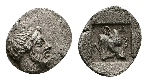 Troas, Lamponeia. AR Hemiobol. 0.37 g 9.27 mm. 4th century BC.
Obv: Bearded hea...