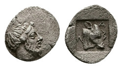 Troas, Lamponeia. AR Hemiobol. 0.37 g 9.27 mm. 4th century BC.
Obv: Bearded head of Dionysos right.
Rev: ΛAM, Head of bull right in incuse square.
...