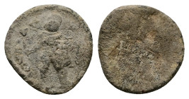 PB Asia Minor. Greco-Roman Lead Tessera. (1st–3rd century AD)
Obv.: Gladiator standing left in fighting post, helmeted, holding sword and shield. Ill...