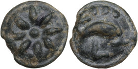 Greek Italy. Northern Apulia, Luceria. Light series. AE Cast Teruncius, c. 217-212 BC. Obv. Star of eight rays on a raised disk. Rev. Dolphin right; a...