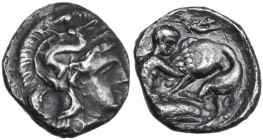 Greek Italy. Southern Apulia, Tarentum. AR Diobol, c. 380-325 BC. Obv. Head of Athena right, wearing helmet decorated with Scylla. Rev. Herakles kneel...