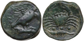Sicily. Akragas. AE Tetras or Trionkion, c. 425-410 BC. Obv. Eagle standing right on hare, head lowered, wings spread. Rev. Crab; above, mussel shell;...