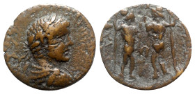 Elagabalus (218-222). Pisidia, Pednelissus. Æ (23mm, 5.16g, 12h). Laureate, draped and cuirassed bust r. R/ The Dioscuri standing facing, looking to e...