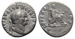 Vespasian (69-79). AR Denarius (19mm, 2.77g, 6h). Rome, AD 74. Laureate head r. R/ Vespasian seated r., holding branch and sceptre. RIC II 702; RSC 36...