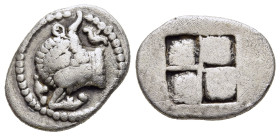 MACEDON. Akanthos. Tetrobol (Circa 500-480 BC). 

Obv: Forepart of a bull left, head right; acanthus flower above.
Rev: Quadripartite incuse square.

...