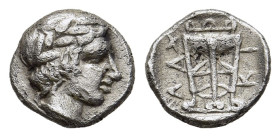 MACEDON. Chalkidian League. Hemiobol (Circa 432-348 BC). Olynthos. 

Obv: Laureate head of Apollo right.
Rev: XAΛKI. 
Tripod.

Robin & Clement Group F...