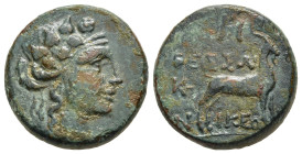 MACEDON. Thessalonica. Ae (After 148 BC).

Obv: Wreathed head of Dionysos right.
Rev: ΘΕΣΣΑΛΟΝΙΚEΩ. 
Goat standing right, monogram to outer left and a...