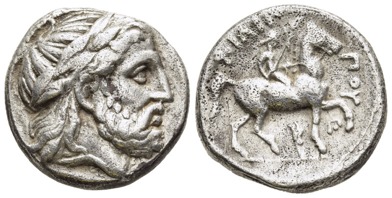 KINGS OF MACEDON. Philip II (359-336 BC). Tetradrachm. Amphipolis.

Obv: Laureat...
