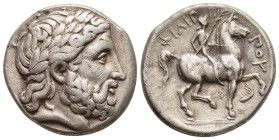 KINGS OF MACEDON. Philip II (359-336 BC). Tetradrachm. Amphipolis.

Obv: Laureate head of Zeus right.
Rev: ΦΙΛΙΠΠOΥ. 
Nude youth on horseback right, h...