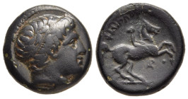 KINGS OF MACEDON. Philip II (359- 336 BC). Ae Unit. Uncertain mint in Macedon. 

Obv: Male head right wearing tainia. 
Rev: Youth on horseback right; ...