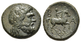 KINGS OF MACEDON. Philip V (221-179 BC). Ae. Uncertain mint in Macedon.

Obv: Wreathed head of Zeus right.
Rev. B-A / Φ.
Rider on horseback right, rai...