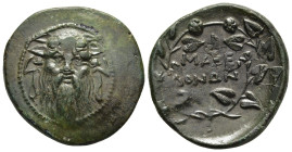 MACEDON AS ROMAN PROVINCE. Ae (Circa 142-141 BC). Thessalonica.

Obv: Facing head of Silenos, wearing ivy wreath.
Rev: MAKE / ΔONΩN. 
Legend in two li...