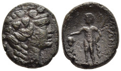 THRACE. Maroneia. Ae (1st century BC)

Obv: Head of Dionysos right, wearing ivy wreath and taenia. 
Rev: MAPΩNITΩN. 
Dionysos standing facing, head to...