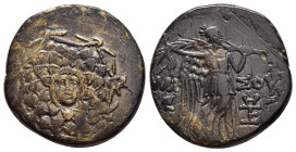 PONTOS. Amisos. Ae (Circa 85-65 BC). Time of Mithradates VI Eupator.

Obv: Aegis facing.
Rev: AMIΣOY. 
Nike advancing right with shouldered palm branc...