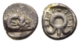 ASIA MINOR. Uncertain mint. Hemiobol (Circa 500-400 BC). 

Obv: Head of ram right.
Rev: Large wreath-like symbol, pseudo-legend around, within incuse ...