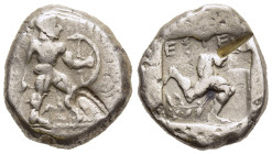 PAMPHYLIA. Aspendos. Stater. (Circa 465-430 BC). 

Obv: Helmeted, nude hoplite advancing r., holding shield and sword; triskeles between legs.
Rev: EΣ...