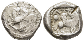 CILICIA. Ura. Stater (Circa 460s-450s BC).

Obv: Winged ibex kneeling left, its head turned back to right; all within border of dots. 
Rev. Winged lio...