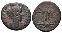 PHOKIS. Delphi. Diva Faustina I (After 141). Ae. 

Obv: ΘƐΑ ΦΑVϹΤƐΙΝΑ.
Draped bust right.
Rev: ΔƐΛΦΩΝ.
Temple.

RPC IV.1, 4601 (temp.).

Rare.

Condit...