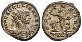 AURELIAN (270-275). Antoninianus. Ticinum. 

Obv: IMP C AVRELIANVS AVG. 
Radiate, draped and cuirassed bust right.
Rev: ORIENS AVG / TXXT. 
Sol standi...