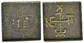 BYZANTINE EMPIRE. Commercial weight (5h- 7th century AD).

A square, bronze 3 Nomismata weight. The top bears the engraved letters = 3 Nomismata withi...