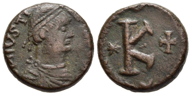 JUSTINIAN I (527-565). Ae 20 Nummi- Half Follis. Rome.

Obv: Pearl-diademed, dra...