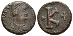 JUSTINIAN I (527-565). Ae 20 Nummi- Half Follis. Rome.

Obv: Pearl-diademed, draped and cuirassed bust right.
Rev: Large K, star to left, cross to rig...