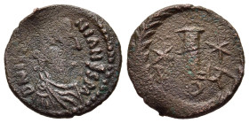 JUSTINIAN I (527-565). Ae Decanummium. Rome.

Obv: D N IVSTINIANVS P A
Pearl- diademed, draped and cuirassed bust right.
Rev: Large I between two star...