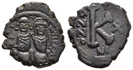 JUSTIN II (565-578). Ae Half follis. Nicomedia (year 10).

Obv: Justin on left and Sophia on right, seated facing, he holds globe and she holds sceptr...