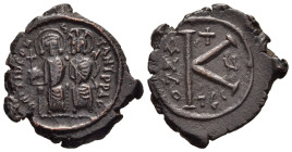 MAURICE TIBERIUS (582-602). Ae Half follis. Thessalonica.

Obv: Maurice and Constantina seated facing, he holds globe and sceptre, she holds sceptre.
...