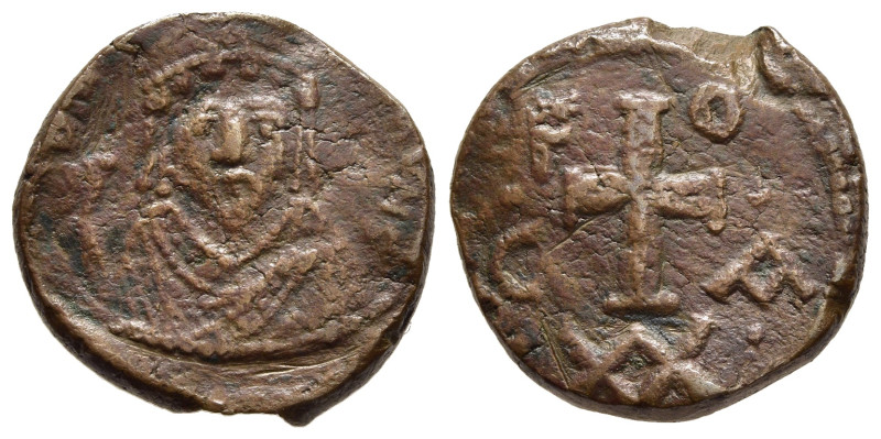 PHOCAS (602-610). Ae Half Follis. Carthage mint. Dated year 6. 

Obv: Crowned bu...