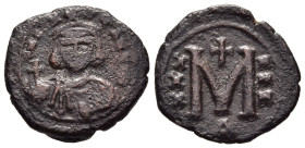 CONSTANTINE V COPRONYMUS (741-775). Ae Follis. Constantinople.

Obv: Crowned and draped facing bust, holding globus cruciger and akakia.
Rev: Large M;...