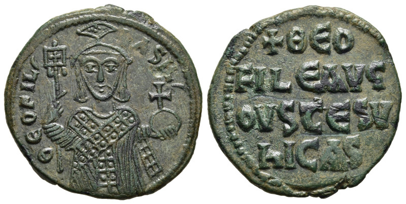 THEOPHILUS (829-842). Ae Follis. Constantinople.

Obv: Facing bust, holding laba...
