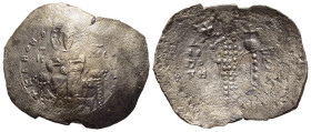 ALEXIUS I COMNENUS (1081-118). Aspron Trachy. Philippopolis.

Obv: + KЄ BOHΘ AΛЄΞIω / IC - XC. 
Christ seated facing on throne with crossed nimbus, ra...