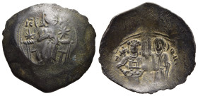MANUEL I COMNENUS (1143-1180). Aspron Trachy. Constantinople.

Obv: Christ Pantokrator seated facing on throne; star to left and right.
Rev: Manuel st...
