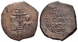 EMPIRE OF THESSALONICA. Theodore Comnenus-Ducas (1224-1230). Ae Tetarteron.

Obv: Cross potent on three steps, facing busts of Theodore to left and St...