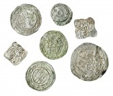 7 monedas: dírhem del emirato; 3 del califato, 1 almohade, 1 nazarí y 1 fatimí. MBC-/MBC.