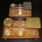 Postal Balance Scales (2) the first with 290mm x 145mm x 150mm, scale on a wooden base, the weighing plate inscribed with Rates of Postage 1oz. To 16o...