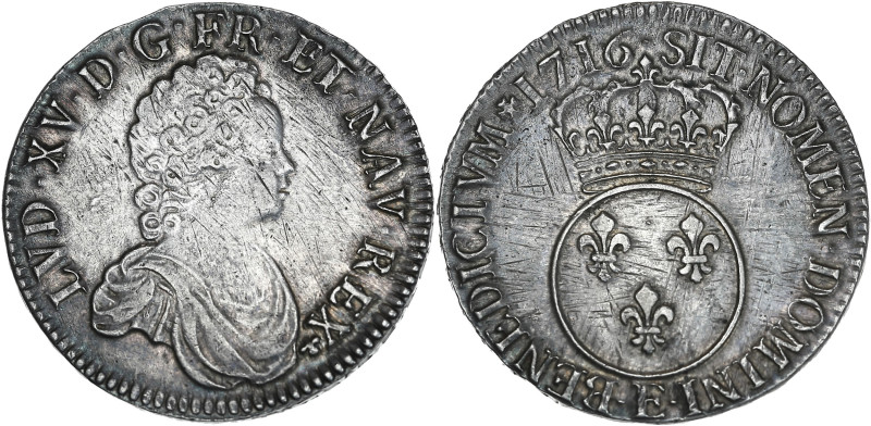 Louis XV - Ecu Vertugadin 1716 E (Tours)
Flan neuf.

Argent - 30,46 grs - 41,5 m...