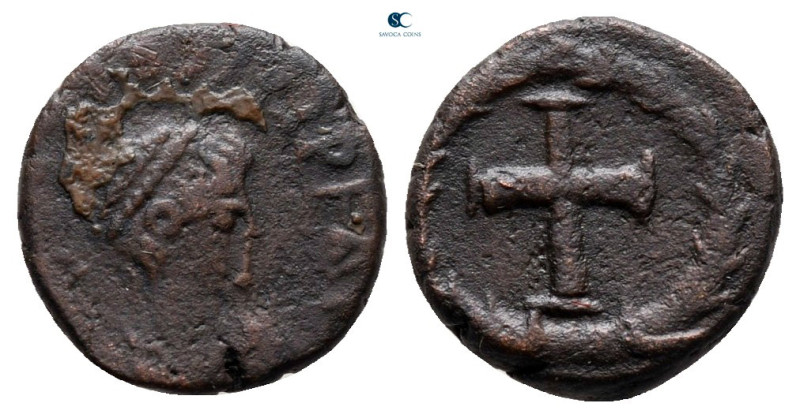 Arcadius AD 383-408. Uncertain mint
Nummus Æ

11 mm, 1,01 g



nearly ver...